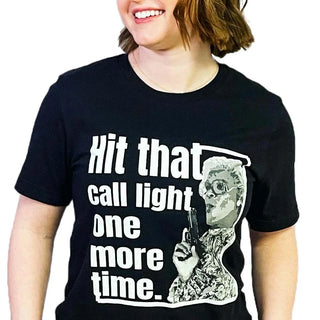 Nurse T-shirt on model that says hit that call light one more time.