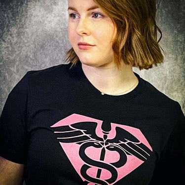 Model wearing black Super hero t-shirt. Super nurse