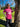 Female model standing next to tree wearing pink nurse mom t-shirt designed for Mother’s Day